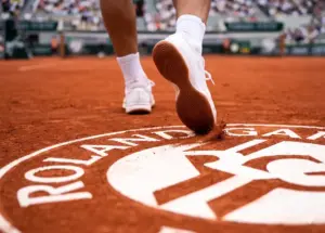 Tennis player's feet zoom on Roland Garros court